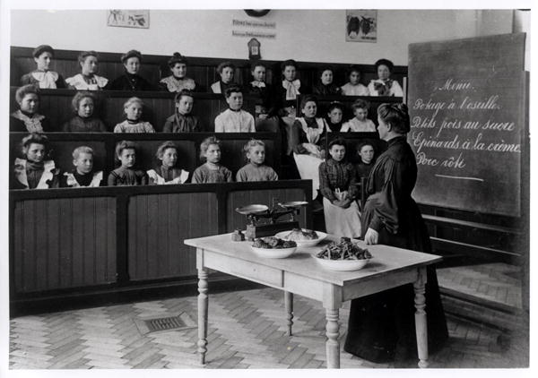 Young girls in a cookery lesson (b/w photo)  from French Photographer