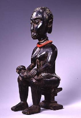 Akan or Asante Mother and Child from Ghana (wood & glass)