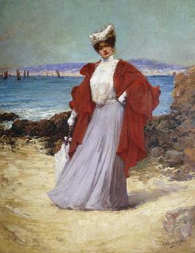 Eine Dame an der Küste.