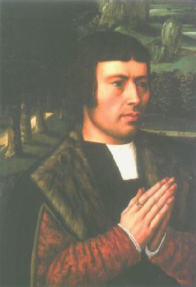 Portrait of a man in the prayer