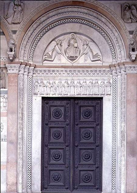 Portal with carved architrave depicting Christ in a Mandorla with two angels and the apostles below from Anonym Romanisch