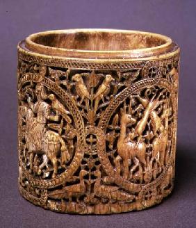 Cylindrical box (with missing lid) with carved decoration of hunting scenesSpanish