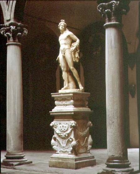 Bacchus on a base designed by Benedetto da Rovezzano (1474-1552) within the inner courtyard designed from Baccio Bandinelli