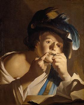 Young man with jew harp