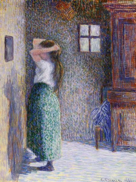 Woman in front of a mirror from Camille Pissarro