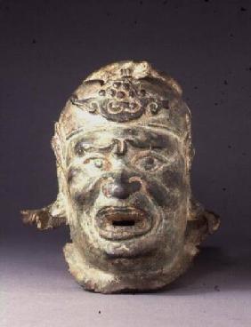 Head of a guardian figure, from the entrance of a tomb or temple, possibly a dvarapala, from the ent
