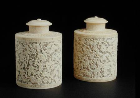 Pair of carved ivory canisters and covers from Chinese School