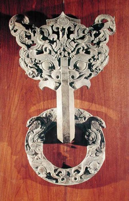'P'u shou' door knocker with a taotie design surmounted by a phoenix and holding a ring with sculpte from Chinese School