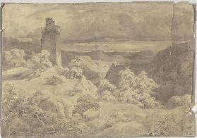 Hügelige Landschaft mit einer Turmruine