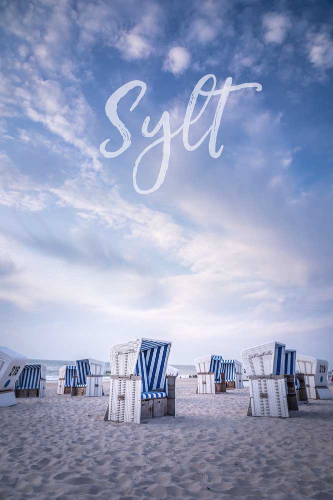 Summer evening with beach chairs with the lettering Sylt from Christian Müringer