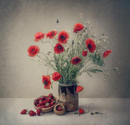 Still life with a strawberry and poppies
