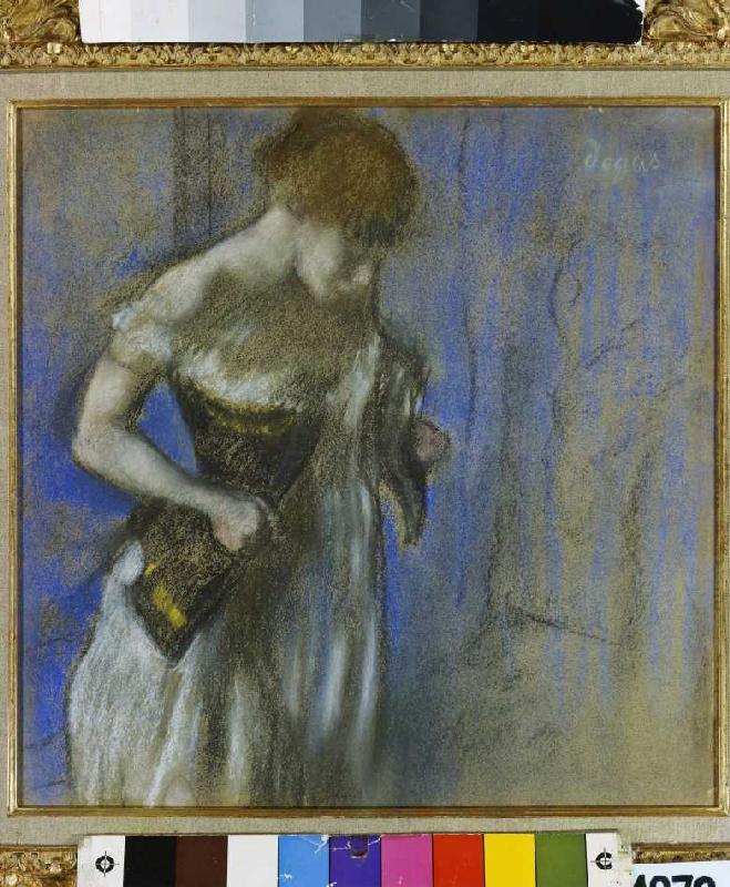 Woman when lacing her corset up. from Edgar Degas