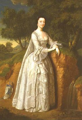 Elizabeth Montague standing in a Wooded Landscape