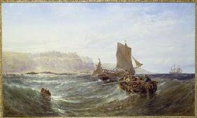 Fishing boats in front of a steep coast