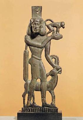 Figure of a man holding a monkey with an ibex licking his knee, Saite Period