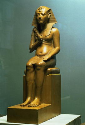 Seated statue of a pharaoh, New Kingdom (stone) from Egyptian 18th Dynasty
