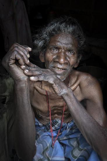 elder in a village at the outskirts of Kolkata, India