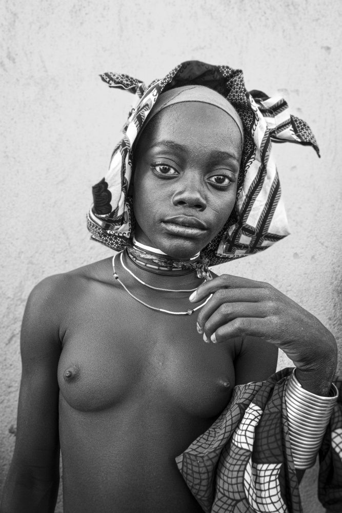 Mucubal teenager at Virei, southern Angola from Elena Molina