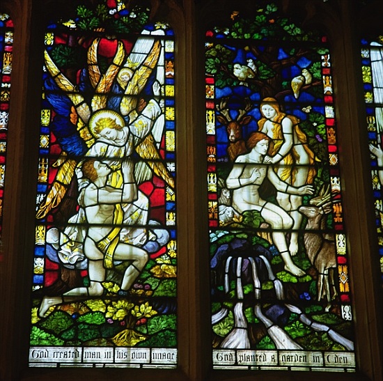 Stained glass windows depicting (LtoR) The Annunciation and Adam and Eve in the Garden of Eden from English School