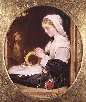 A Lady Sewing at a Window