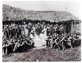 White Fathers before a chapel in adobe at Mugera (Urundi), before 1914 (b/w photo)