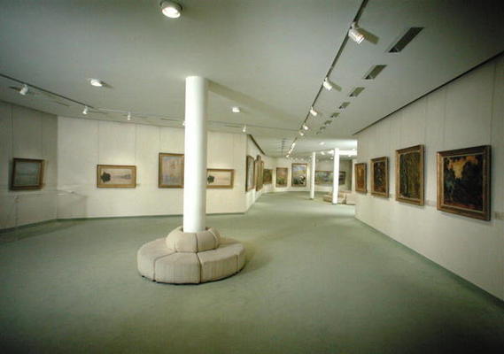 View of the basement exhibiting works by Claude Monet (1840-1926) (photo) from French School, (20th century)