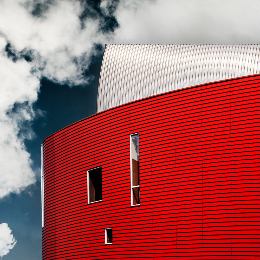 Three tiny windows in red wall from Gilbert Claes