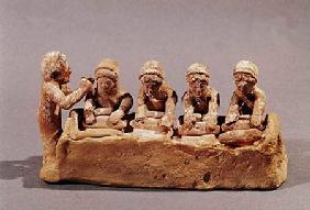Bakers kneading dough to the sound of a flute, found at Thebes, Boeotia