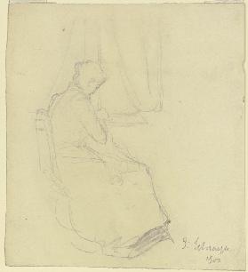 Woman sewing at the window