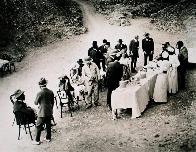 Distinguished visitors taking refreshments near the Tomb of Tutankhamun at the opening of the inner  from Harry Burton