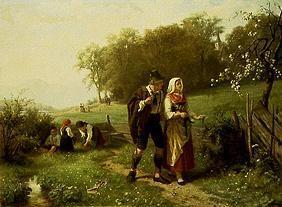 Young alpine couple in spring