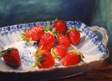 Strawberries into porcelain bowl from Ingeborg Kuhn