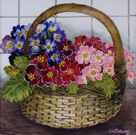 Red Mauve and Pink Primroses in a Basket