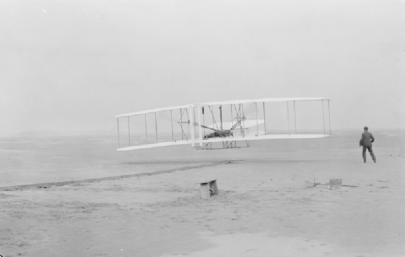 First flight, Kitty Hawk, North Carolina, 120 feet in 12 seconds, 10.35am December 17th 1903 (b/w ph from John T. Daniels
