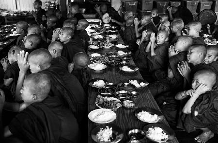 Praying before meal of the novice monks
