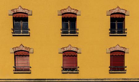 symmetrical windows on a warm background