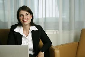 Confident business woman smiling