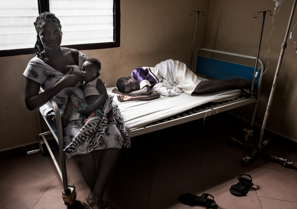 A grandmother breastfeeds her grandson while visiting her sick daughter - Ghana from Joxe Inazio Kuesta Garmendia