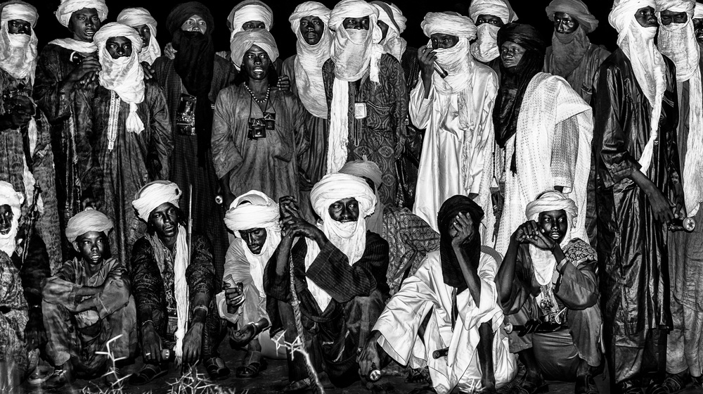 At night, in the heat of a bonfire in the gerewol festival - Niger from Joxe Inazio Kuesta Garmendia