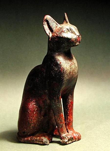 Statuette of a cat with gold earrings, the sacred representation of the goddess Bastet from Late Period Egyptian