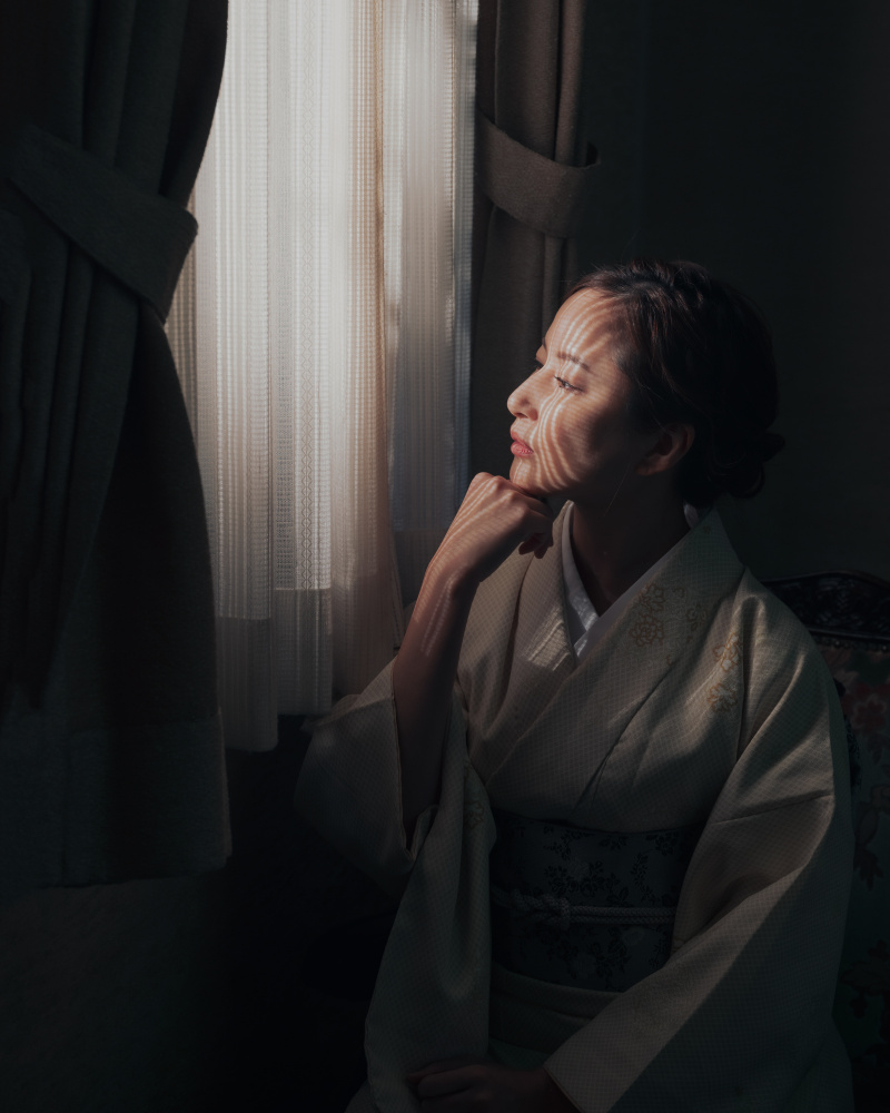 Woman lost in thought from Masayuki Kato