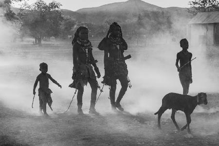 Simba children return from grazing