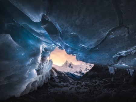 Ice cave and snow mountain