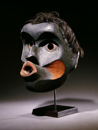A Kwakiutl Wood Face Mask, Dzunuk''wa from 