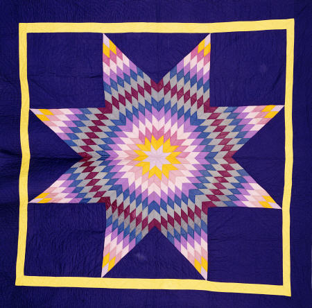 An Amish Pieced & Quilted Cotton Coverlet Worked In A Multicolored Lone Star On A Navy Background from 