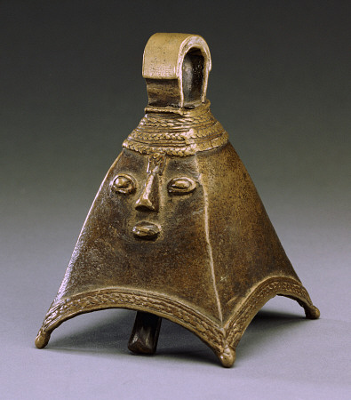An Owo Brass Bell Of Pyramidal Form With A Human Face In Relief from 