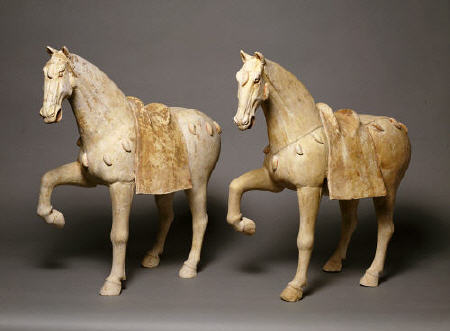 A Pair Of Buff Pottery Figures Of Prancing Caparisoned Horses from 