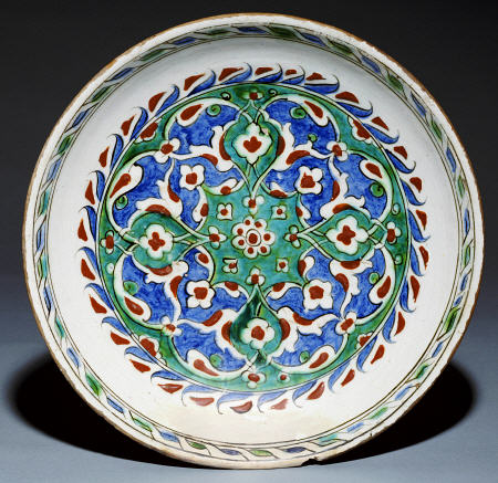 A Rimless Iznik Pottery Dish, C from 