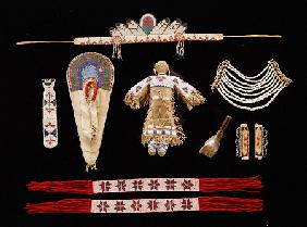 A Collection Of Objects Including Plains Beaded Necktie,  Model Cradleboard, Doll And Neck Ornament