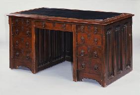 An Oak Kneehole Desk By A
